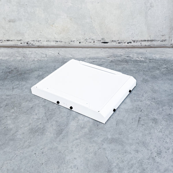 top view of white starlink mini mount with white cover for rola titan and front runner roof racks